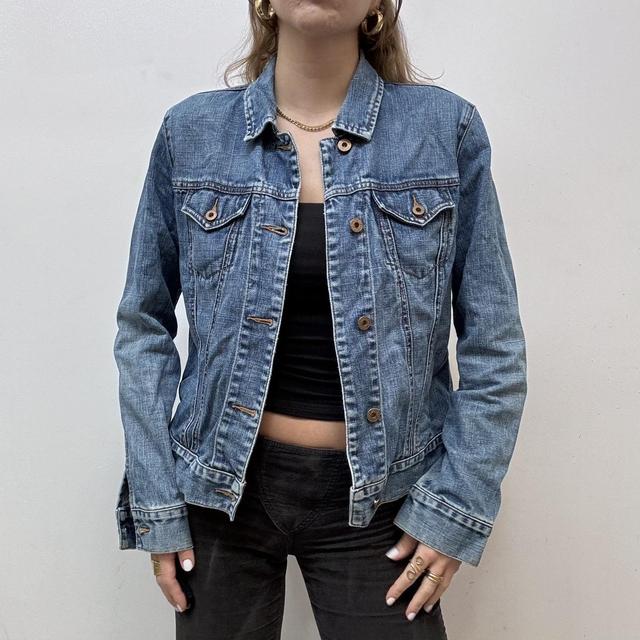 Distressed denim jacket