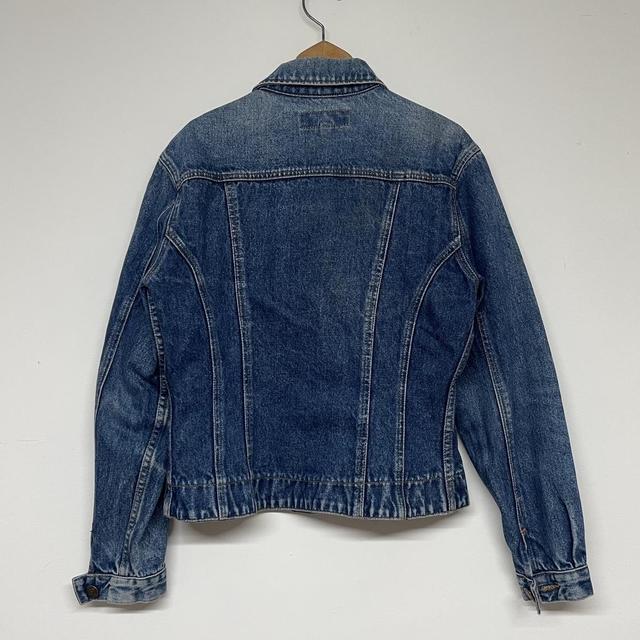 Distressed 90s denim jacket