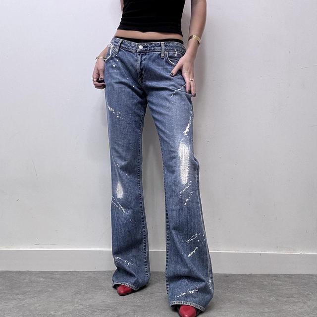 Flared distressed flared painted jeans