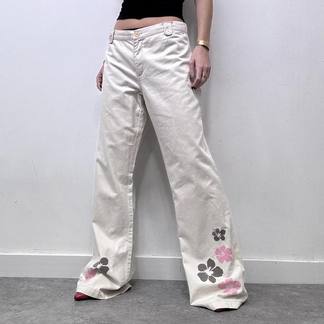 Flared beige wide leg printed trousers