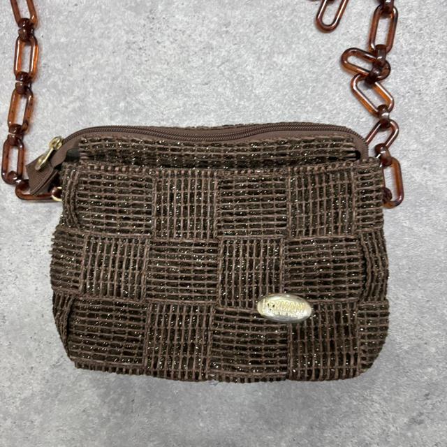 Brown woven crossbody bag