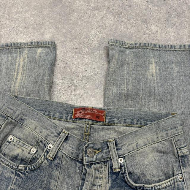 Distressed denim patchwork jeans
