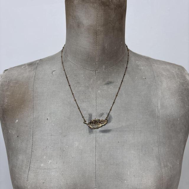 Gold feather hippie pendant