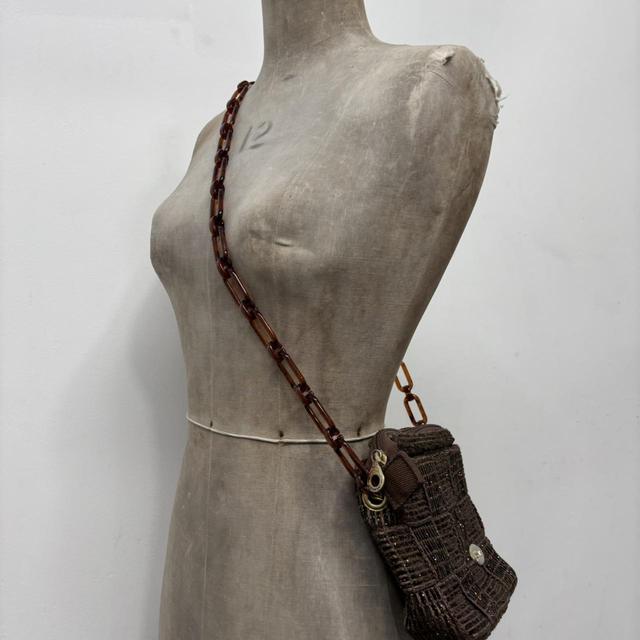 Brown woven crossbody bag