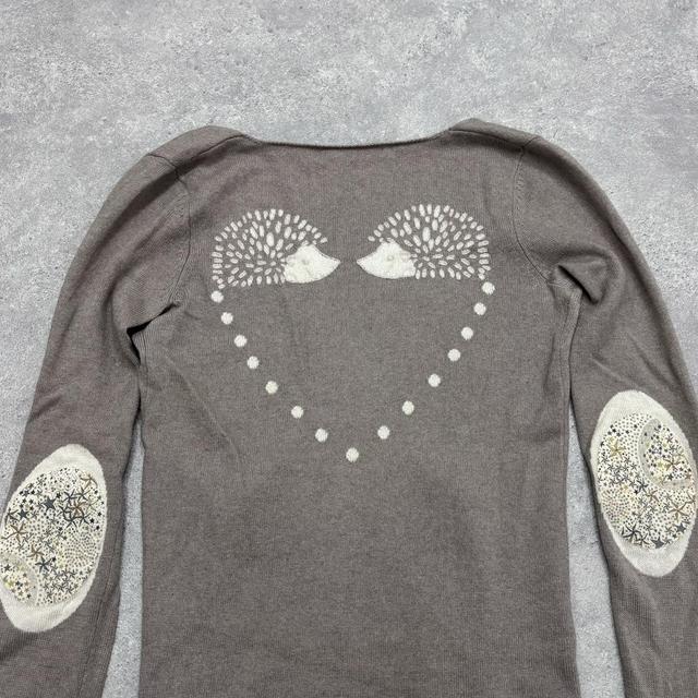 Brown slouchy wool jumper graphic back detail