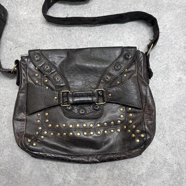 Studded brown leather bag