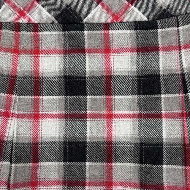 Black and red checked pleated kilt