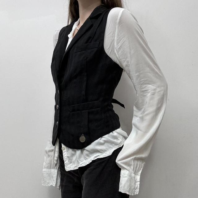 Pinstripe Galliano newspaper waistcoat