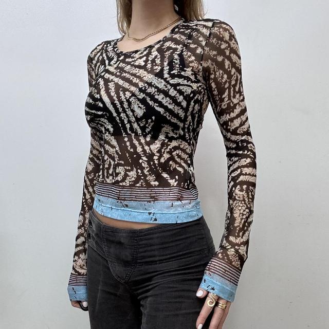 Sheer distressed graphic print mesh top