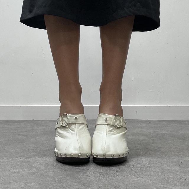 White studded buckle mule heels