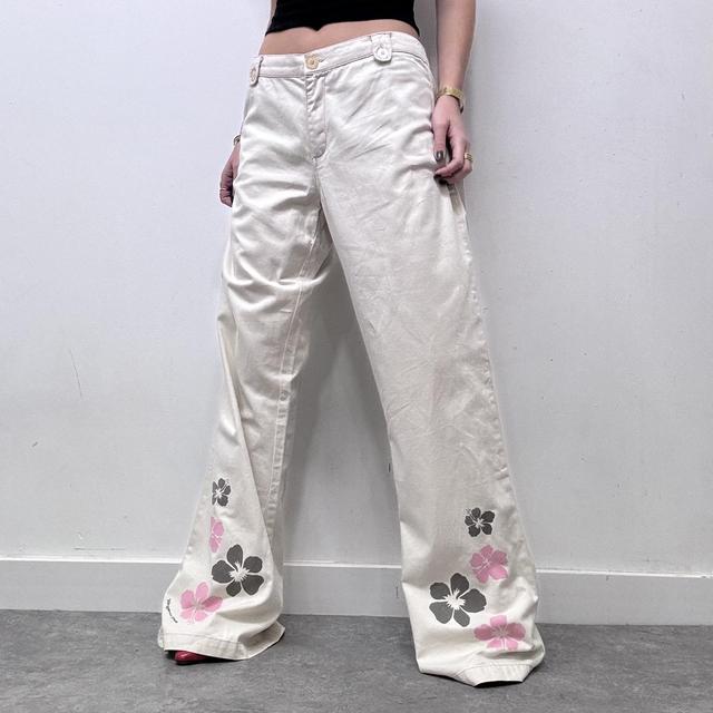Flared beige wide leg printed trousers