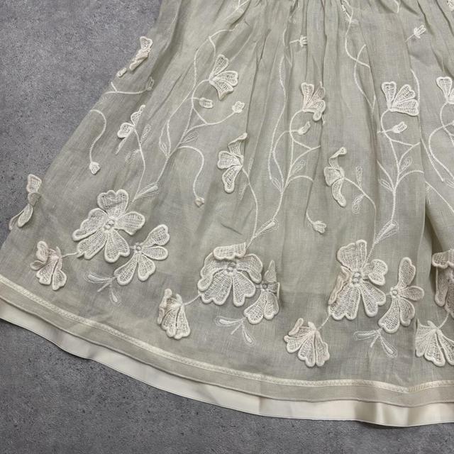 Cream flared puff appliqué midi skirt
