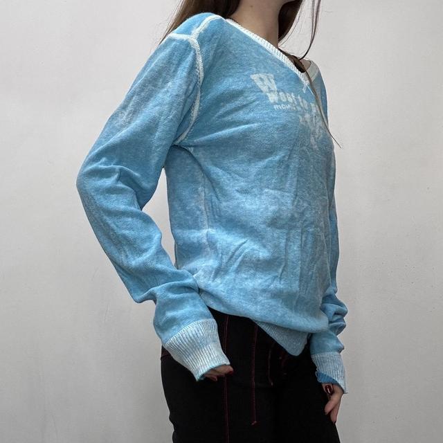 Slouchy oversized distressed knit jumper