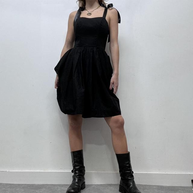 Black puff corset bow dress