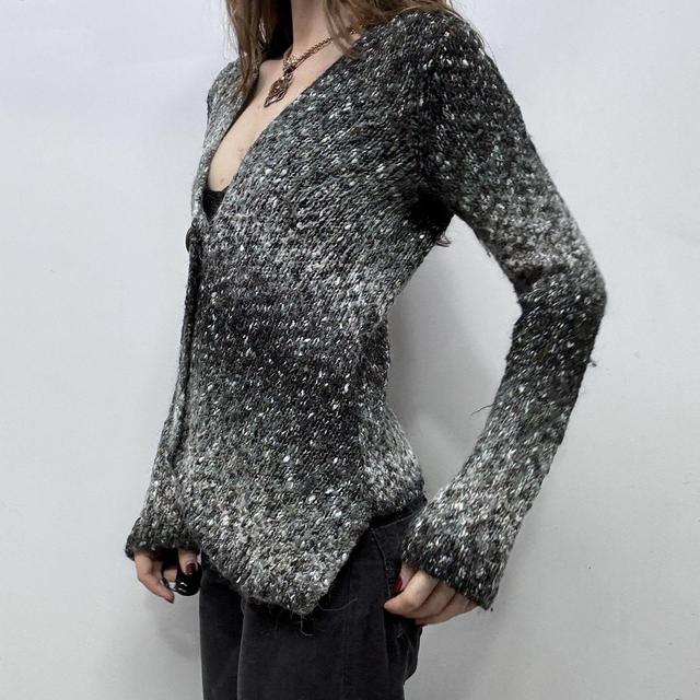Asymmetric knitted flared jumper