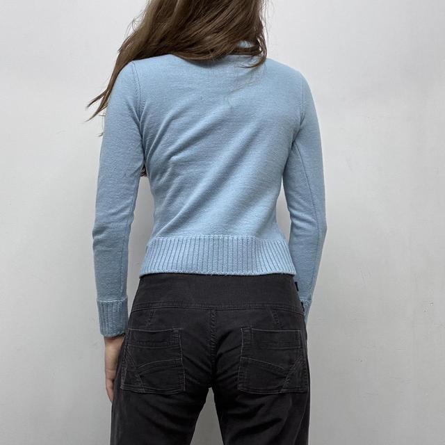Pale blue wool knitted ribbed polo neck jumper