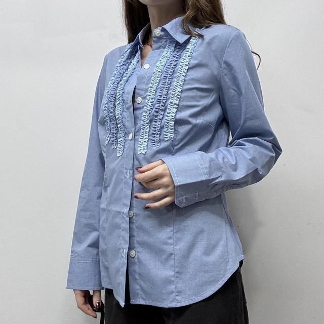 Blue pinstripe ruffle shirt