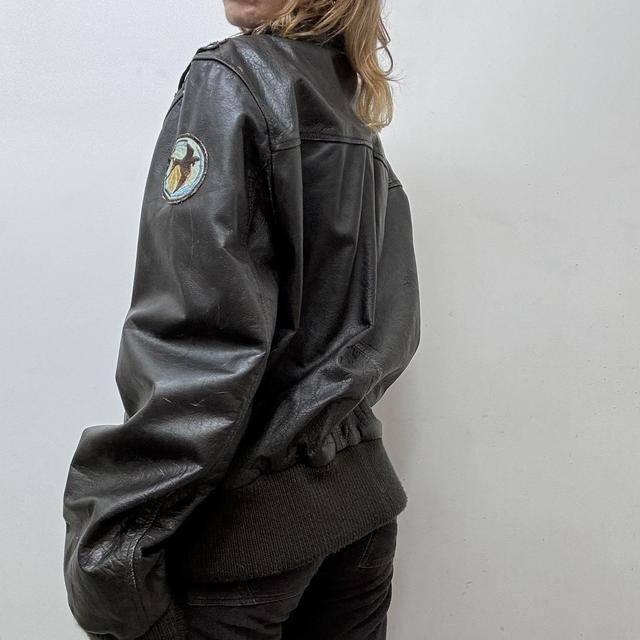 Oversized brown leather jacket