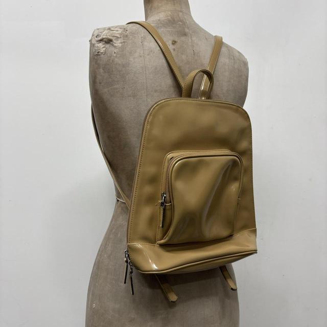 Tan paintent PVC backpack