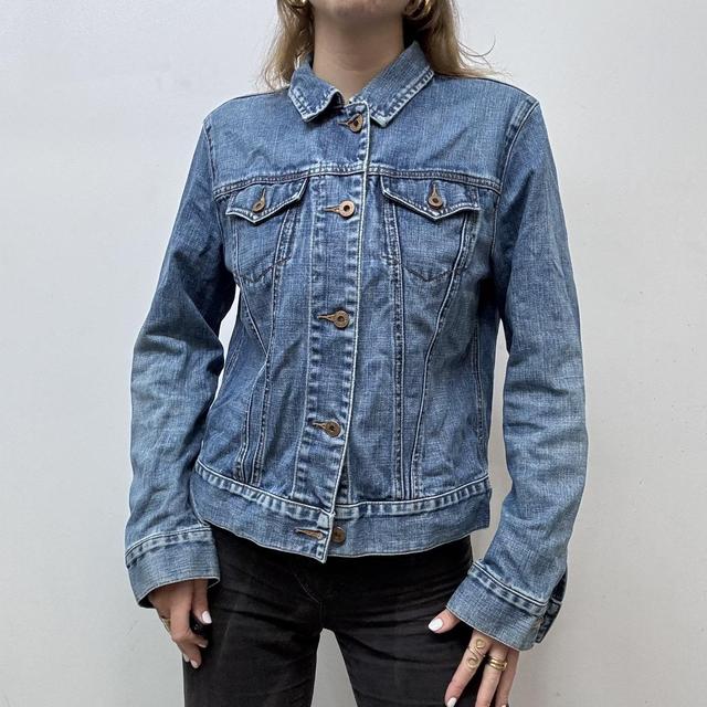 Distressed denim jacket