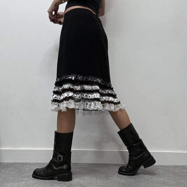 Black fitted aline skirt with lace ruffle hem