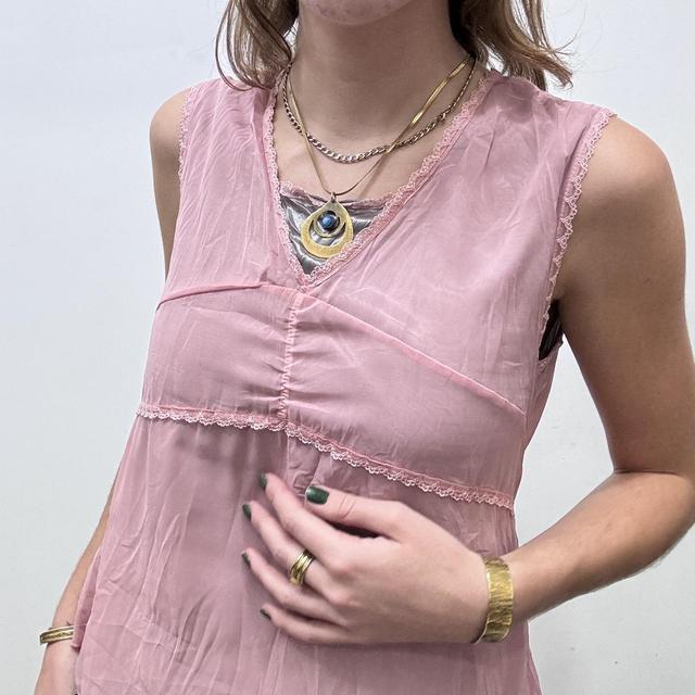 Sheer pink lace layered vest