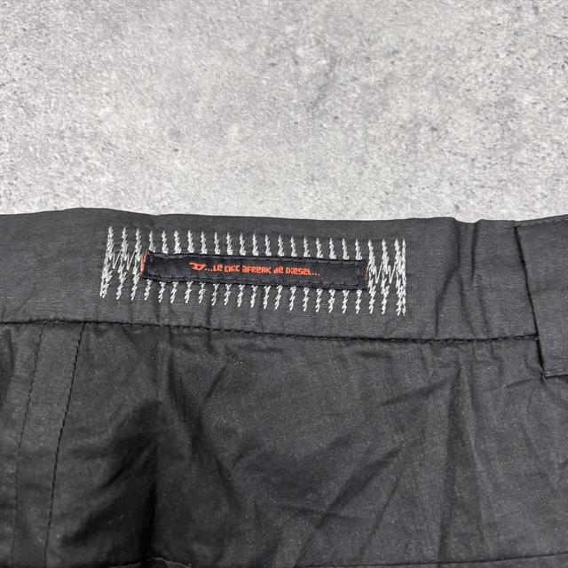 Diesel black slit flare trousers