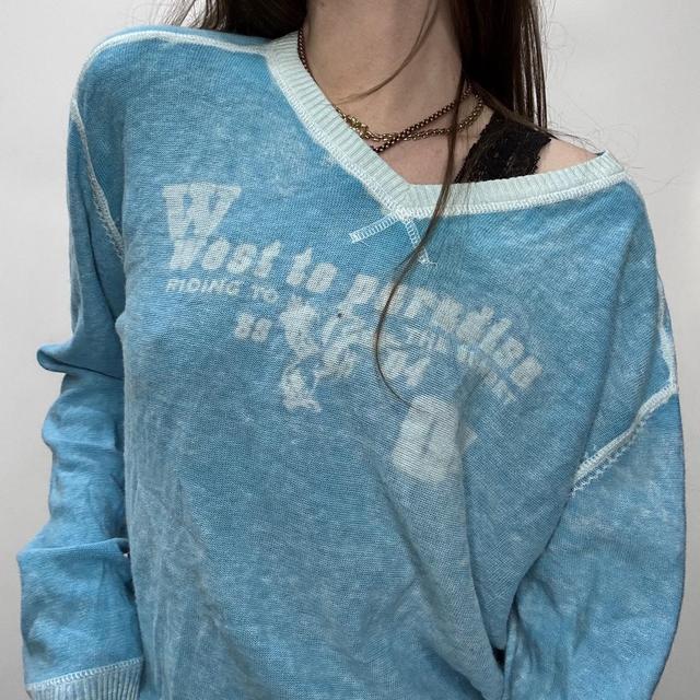 Slouchy oversized distressed knit jumper