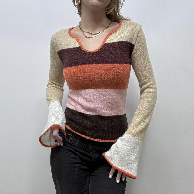 Flared knitted striped jumper