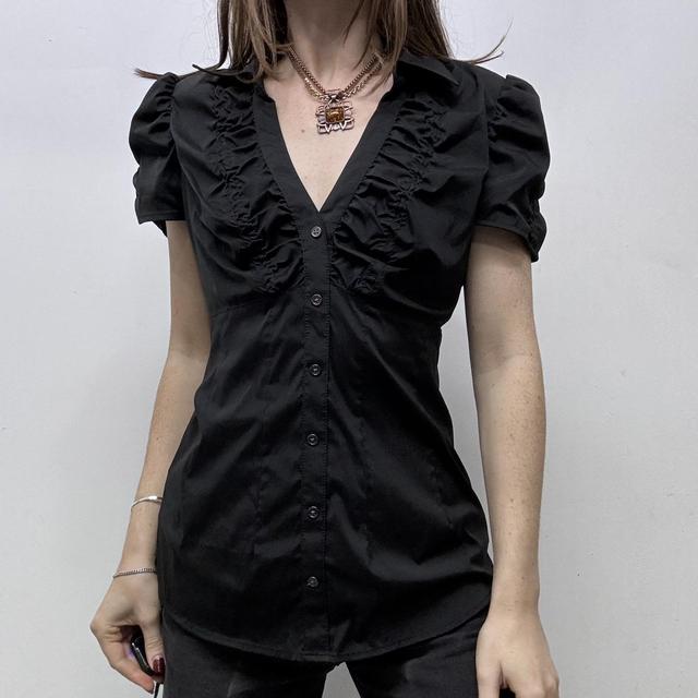 Gathered cinched black puff shirt