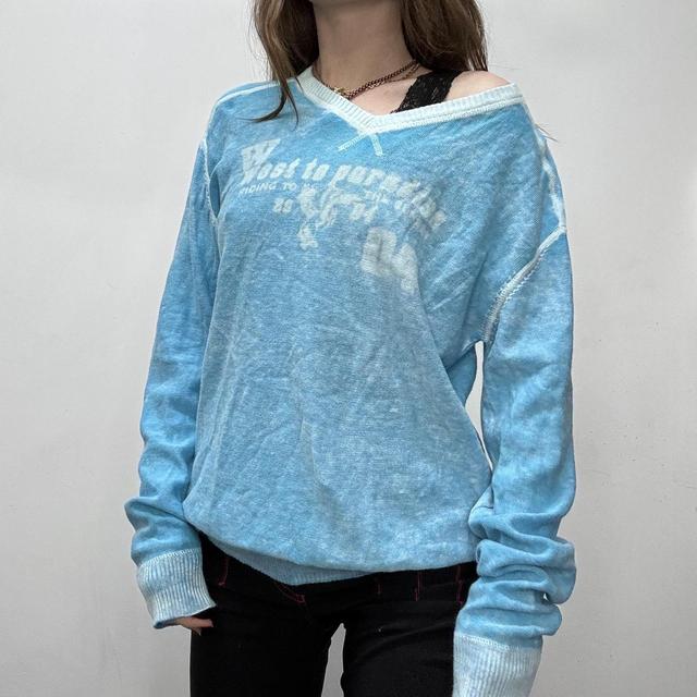 Slouchy oversized distressed knit jumper