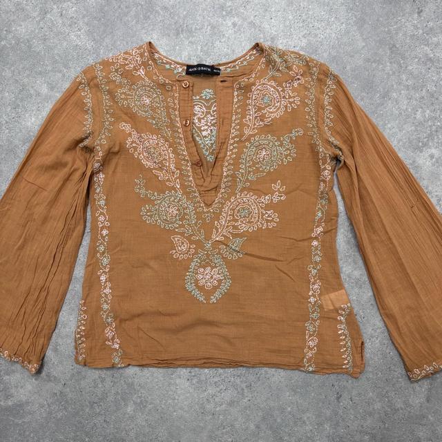 Orange cotton embroidered flared shirt