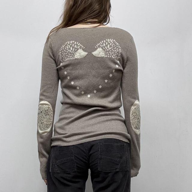 Brown slouchy wool jumper graphic back detail