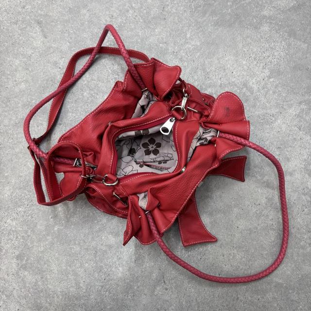 Red leather bow bag