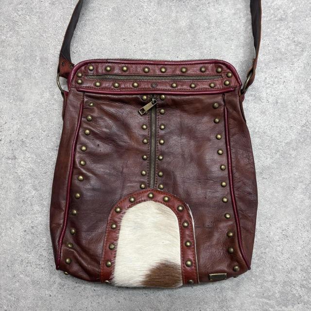 Cow hide studded brown leather bag