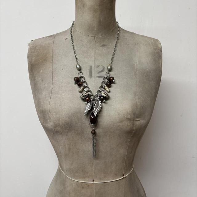 Silver drape charm necklace