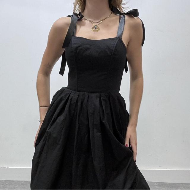 Black puff corset bow dress