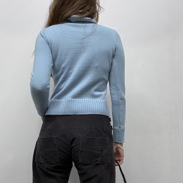 Pale blue wool knitted ribbed polo neck jumper