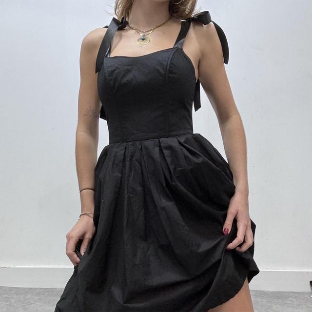 Black puff corset bow dress