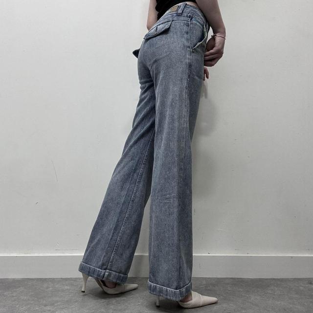 Low rise distressed flared jeans