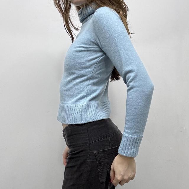 Pale blue wool knitted ribbed polo neck jumper