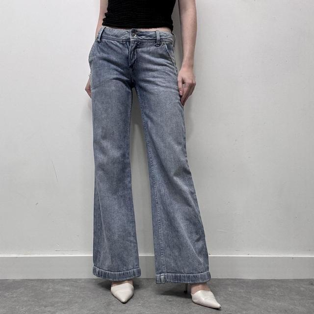 Low rise distressed flared jeans