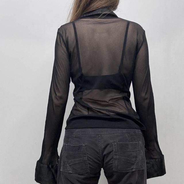 Sheer black flared shirt