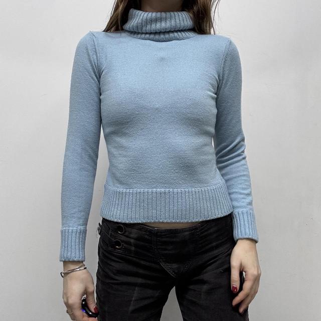 Pale blue wool knitted ribbed polo neck jumper
