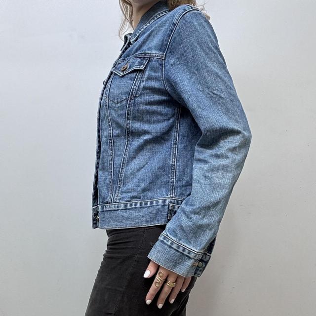 Distressed denim jacket