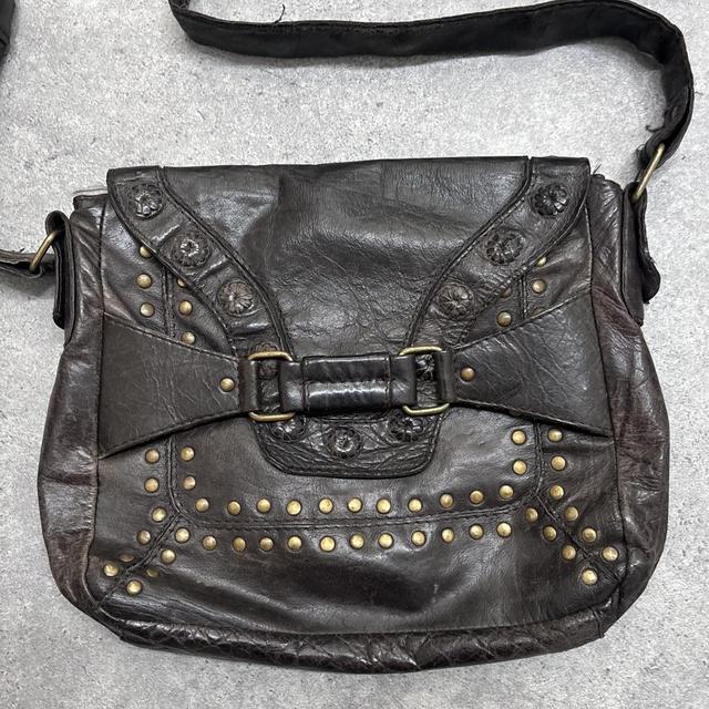 Studded brown leather bag