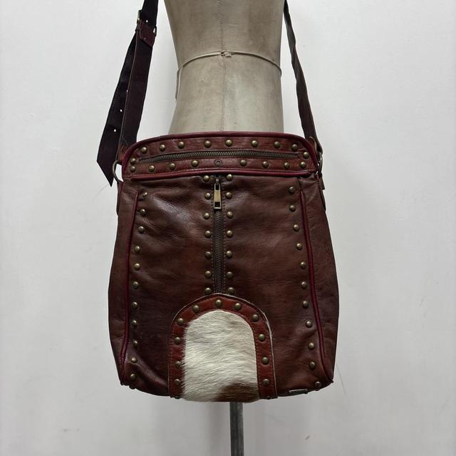 Cow hide studded brown leather bag