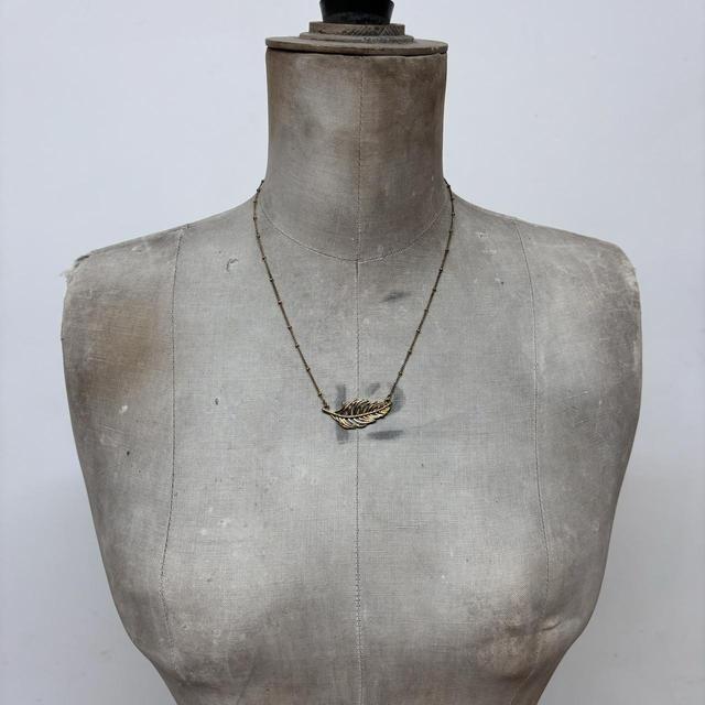 Gold feather hippie pendant