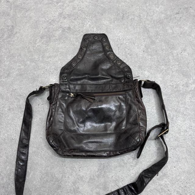 Studded brown leather bag