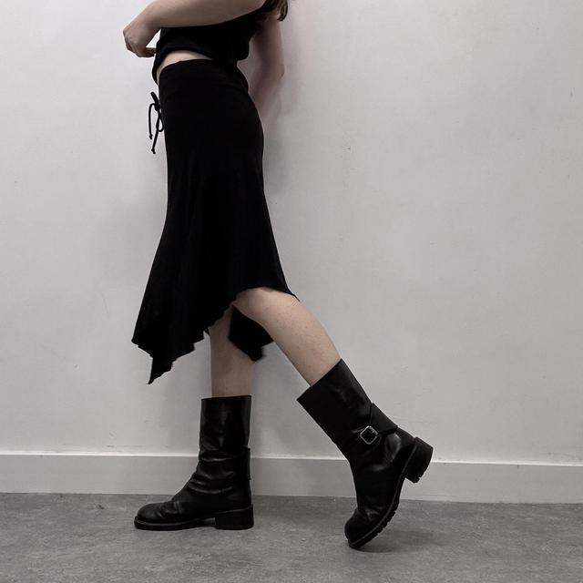 Black asymmetric midi skirt